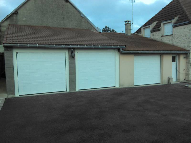 Pose de portes sectionnelles d'un garage double chez un particuliers 